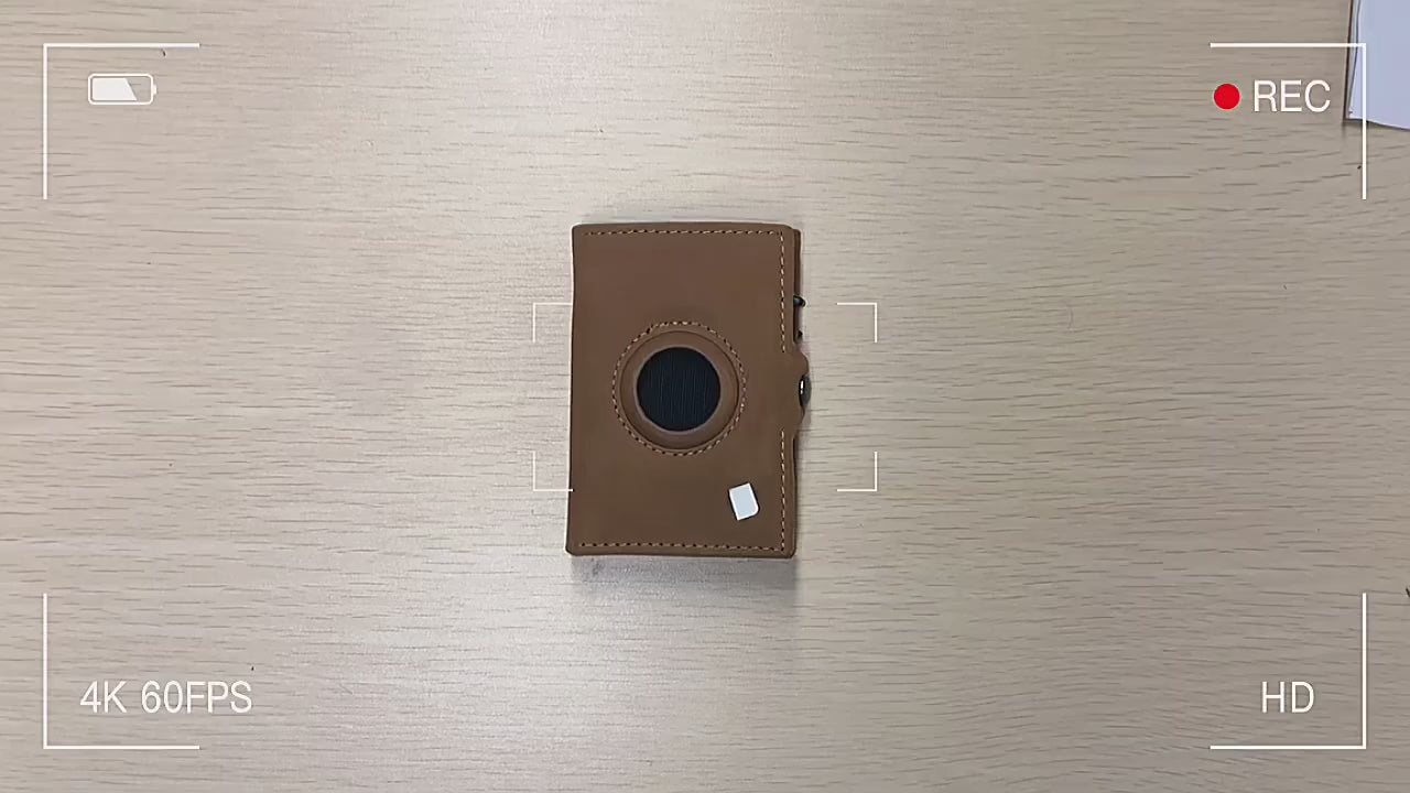 Billetera de cuero con AirTag y bloqueo RFID, diseño elegante y funcional para máxima seguridad. Ideal para ejecutivos y viajeros que buscan estilo, tecnología y protección en un solo accesorio.